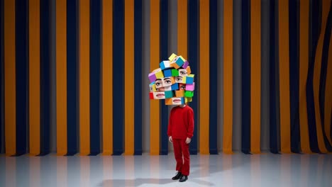 person in red clothing standing in a room with orange and blue striped walls, head replaced by a cluster of colorful cubes with various facial features, creating a surreal portrait