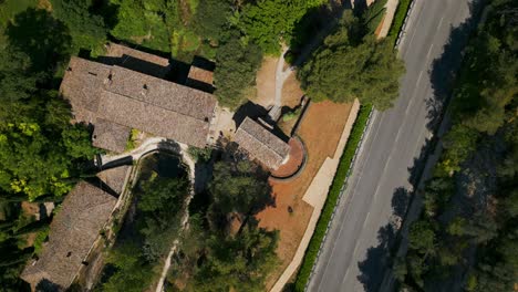 Aerial-Birds-Eye-View-Over-Roof-Of-Temple-of-Clitumnus-Beside-Via-Virgilio,-139