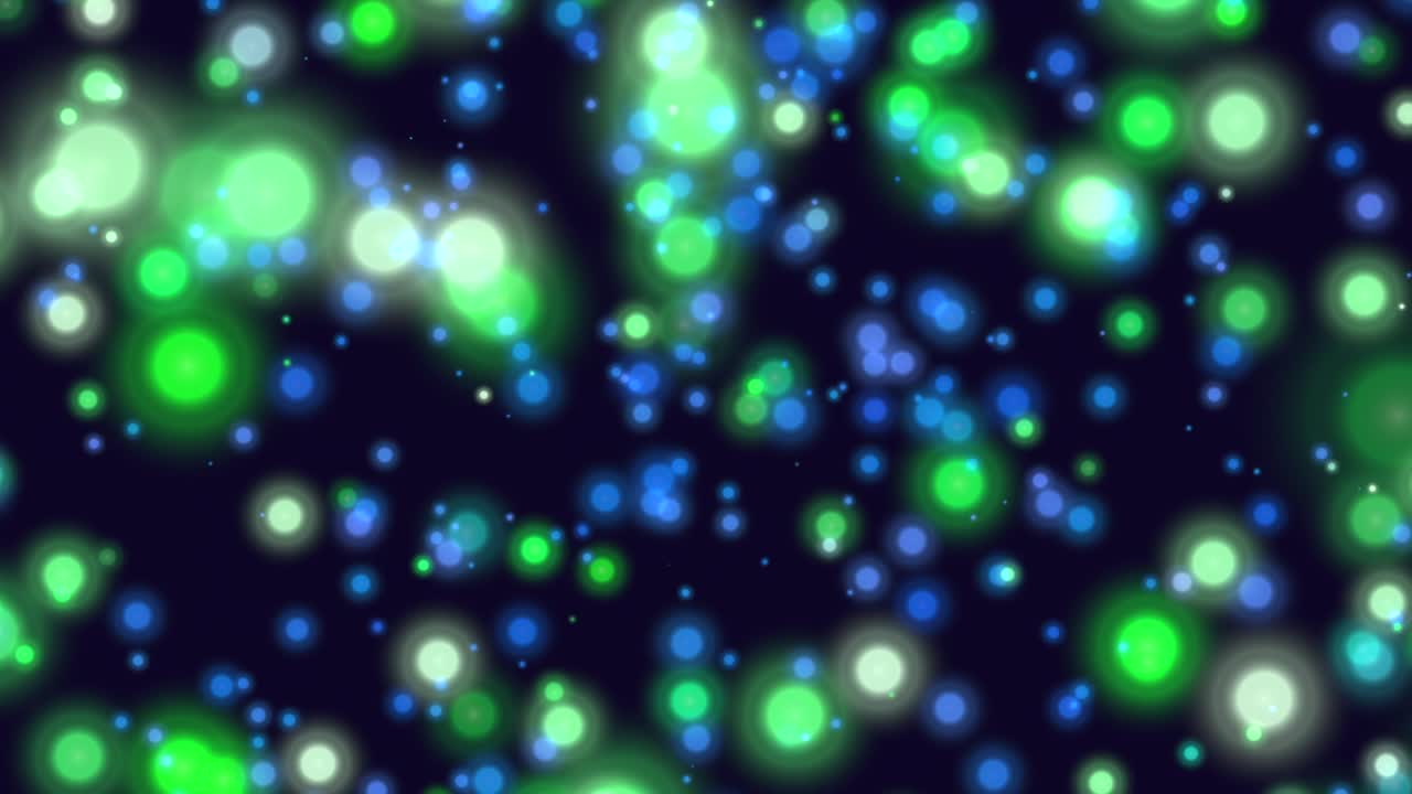 어두운 공간에서 작은 보라색 반짝임과 둥근 보케를 날립니다.