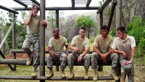 Military-troops-relaxing-during-obstacle-course-4k