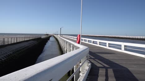 Empty-palisade-devoid-of-people-on-a-clear-day,-Nieuwpoort,-Belgium,-wide-shot