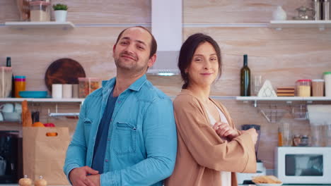 married couple smiling at camera