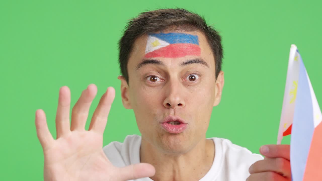 Close up of a man supporting philippine team