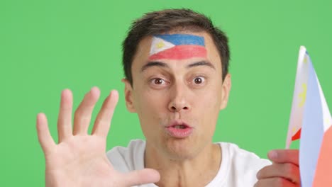 close up of a man supporting philippine team