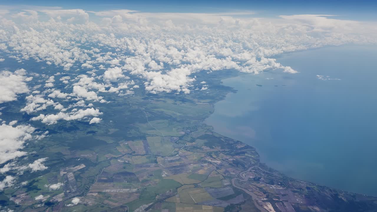 View of Nicaragua and ocean from commercial flight wide view