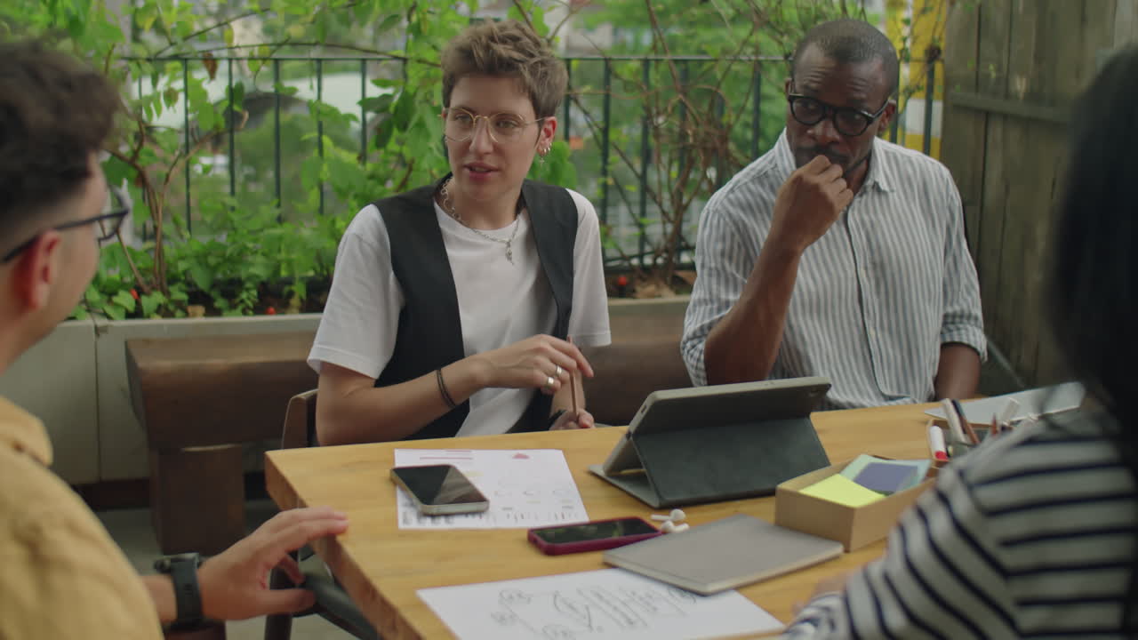 Business meeting with diverse coworkers