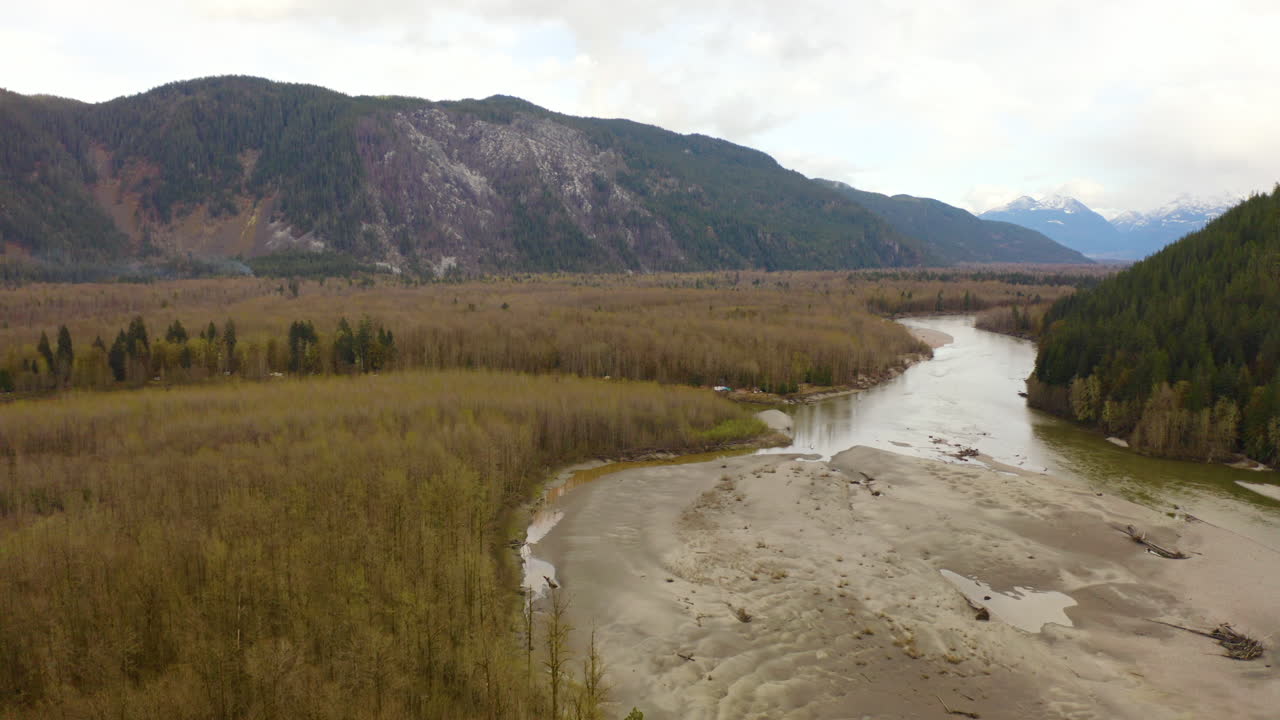 Aerial view over a stream in the mountain wilderness of British Columbia, Canada