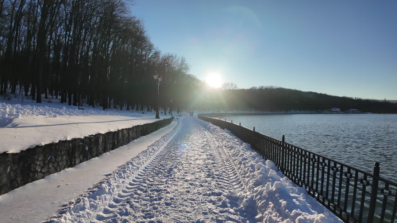 Valea Morilor lake and park covered in white snow in winter in Chisinau, Moldova