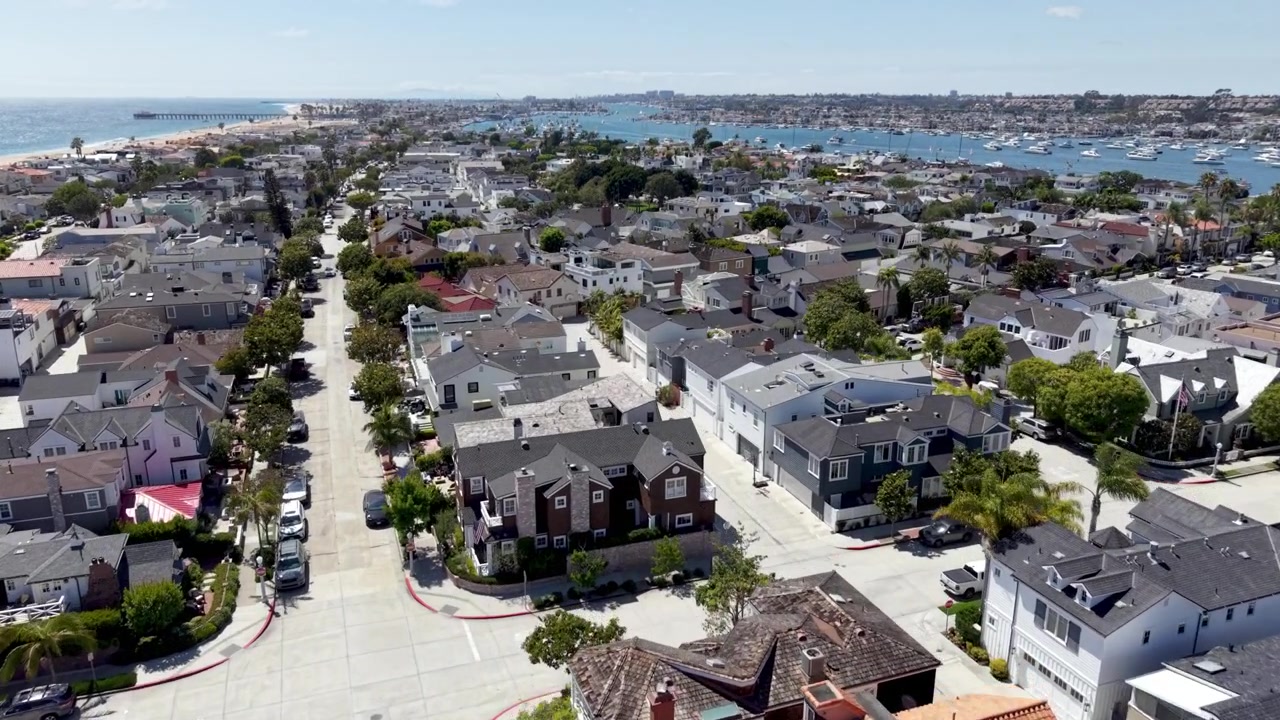 aerial rising up above newport beach california beach homes