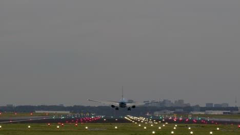 airplane landing at dusk