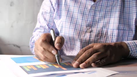 businessman analyzing graphs