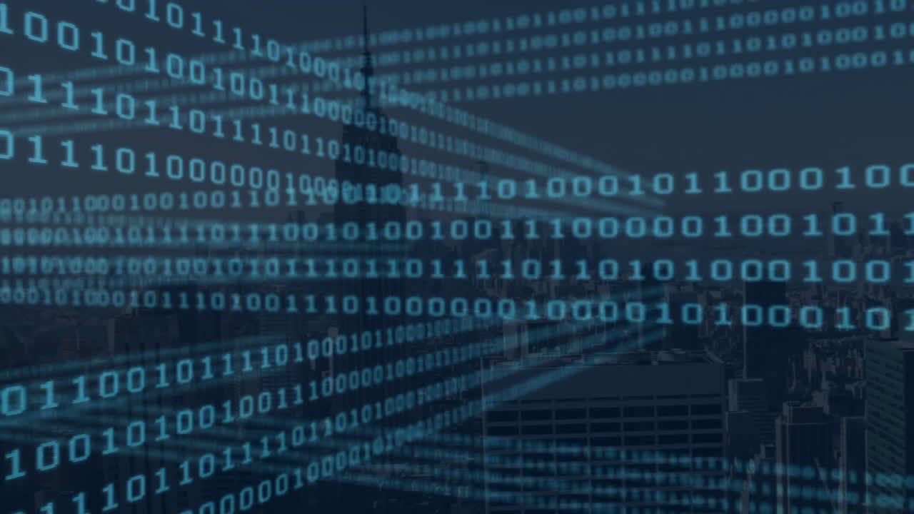 Animation of binary codes moving over empire state building and cityscape