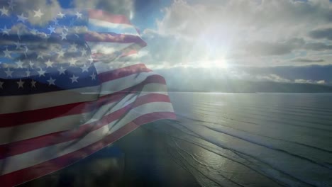 digital composition of us flag waving against aerial view of waves in the sea