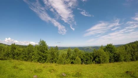 time lapse video over the clouds approaching in the mountains near cluj city in romania