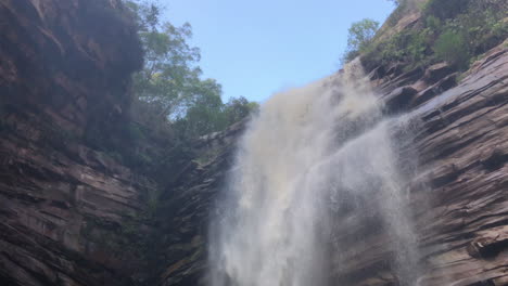 movement video from the top to the bottom of a beautiful waterfall in bahia brazil