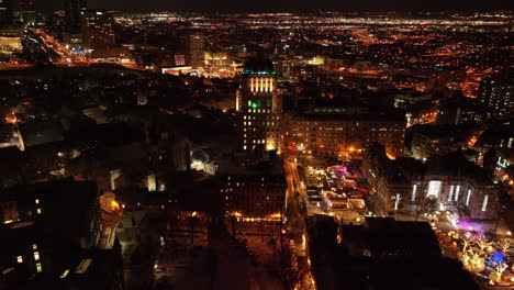 view of old quebec neighbourhood in quebec city, canada during nighttime - aerial drone shot