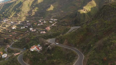 A-car-driving-curves-on-the-street-in-the-mountains