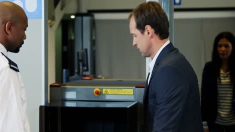 passenger going through a airport security check