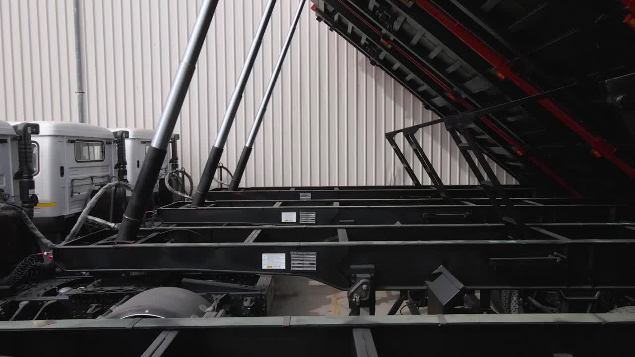 Close-up of a dump truck's hydraulic lift system