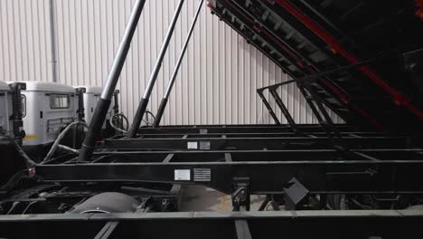 close-up of a dump truck's hydraulic lift system