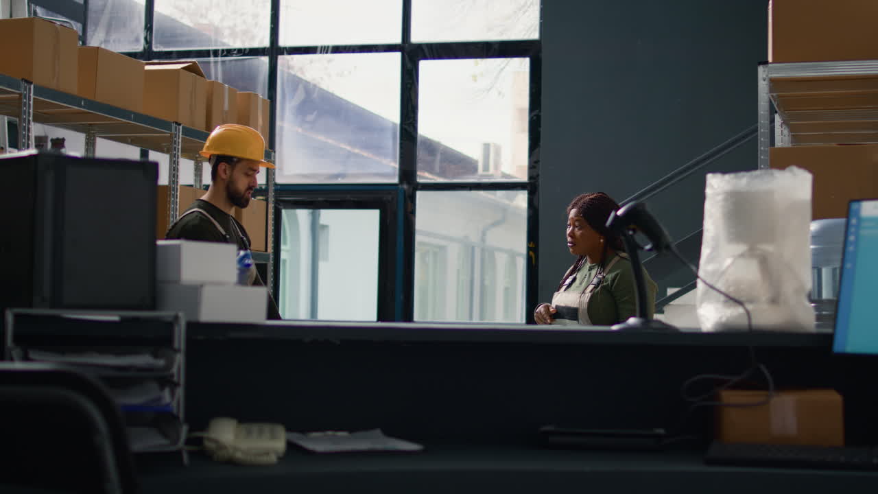 Warehouse workers checking inventory
