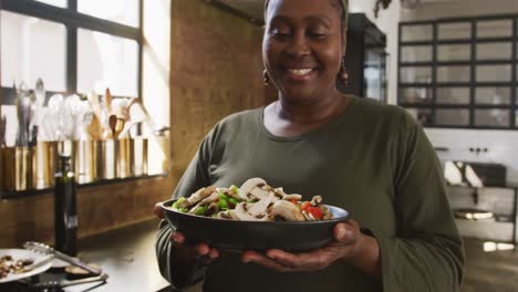 chef showing her dish