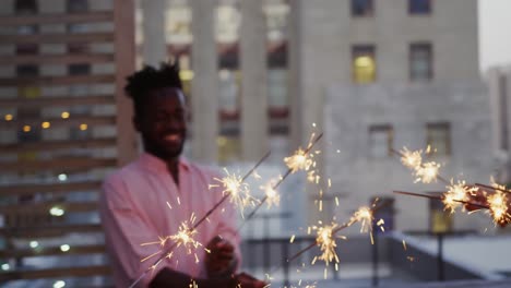 Young-adult-friends-hanging-out-on-a-rooftop