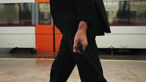 Tourist man with suitcase baggage in spain, A traveler with luggage suit jacket on business street go to a hotel, business office, airport terminal, enjoying the vibrant atmosphere