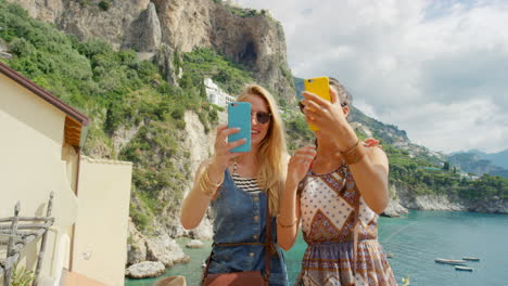 two friends taking selfie on vacation in italy