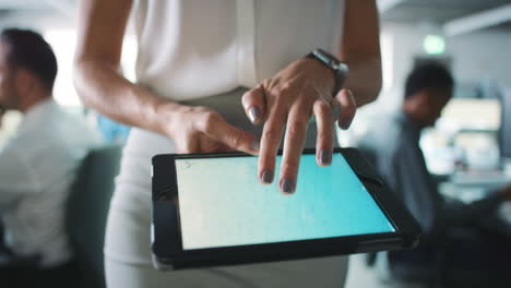 business woman using tablet in office