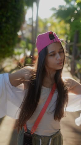 young woman posing outdoors