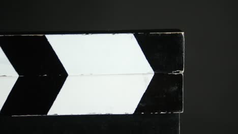 Clapperboard on a dark background