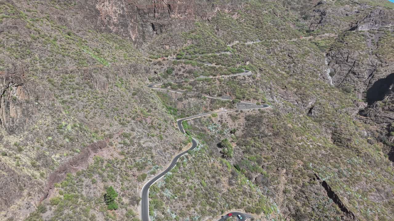 Drone capture of curvy road cutting through Masca Gorge in Tenerife, Canary Islands
