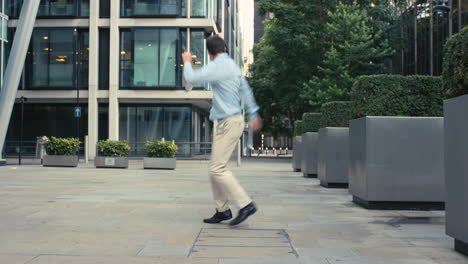 man walking in a city