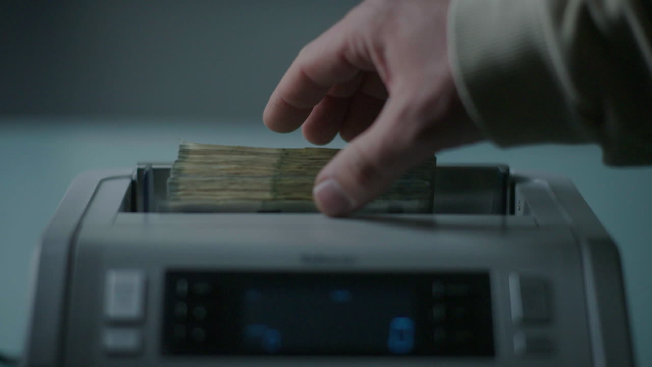 Euro banknotes being processed in a counting machine