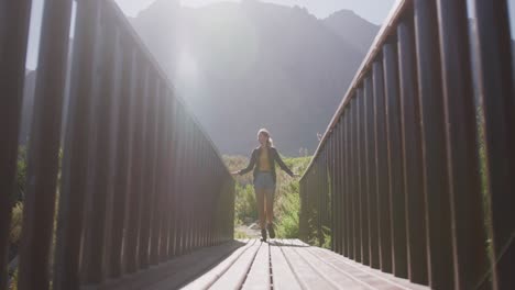 caucasian woman hiking in nature.