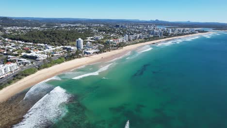 Aerial-View-Of-Alexandra-Headland-Beach-Coastal-Suburb-In-The-Sunshine-Coast-Region,-Queensland,-Australia