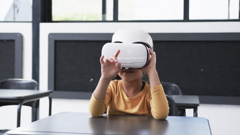 In-a-school,-a-young-biracial-student-explores-virtual-reality