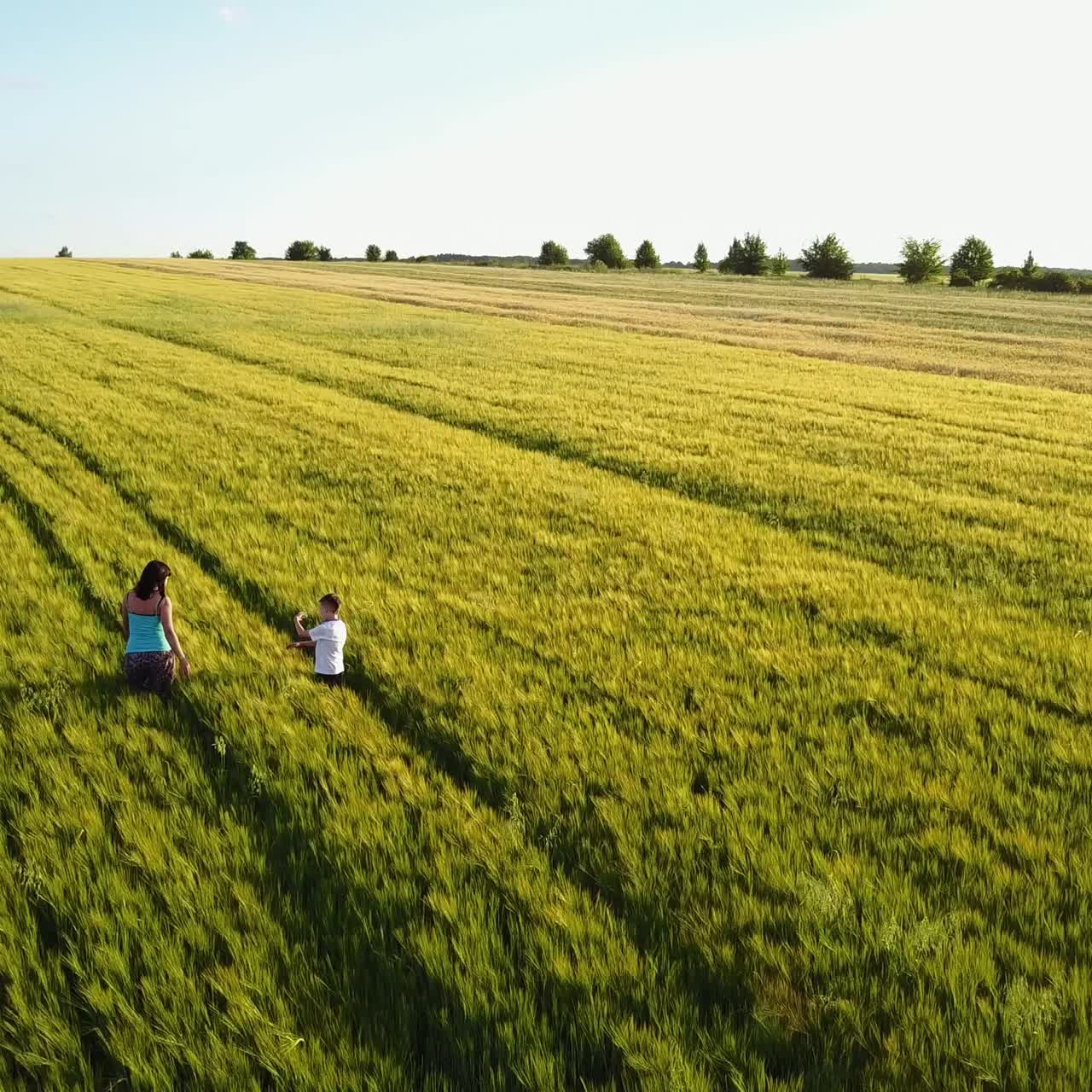 Mother Walking With Her Son