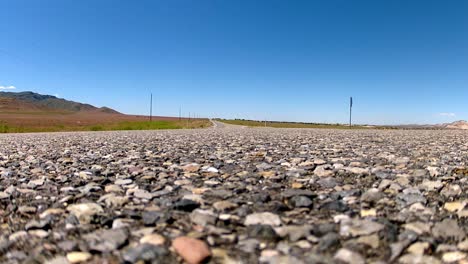 a red vehicle traveling on road