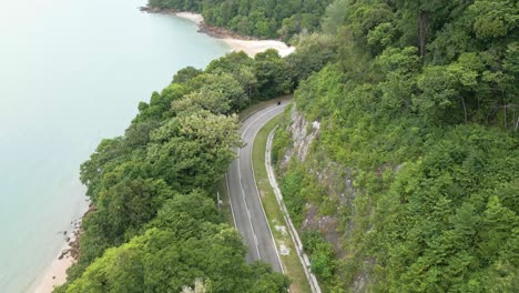 Aerial-drone-shot-of-a-road-in-the-middle-of-the-abyss