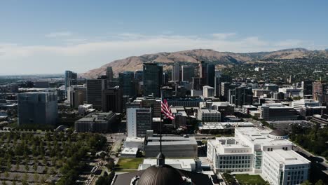 drone shot flying through salt lake city's downtown sector