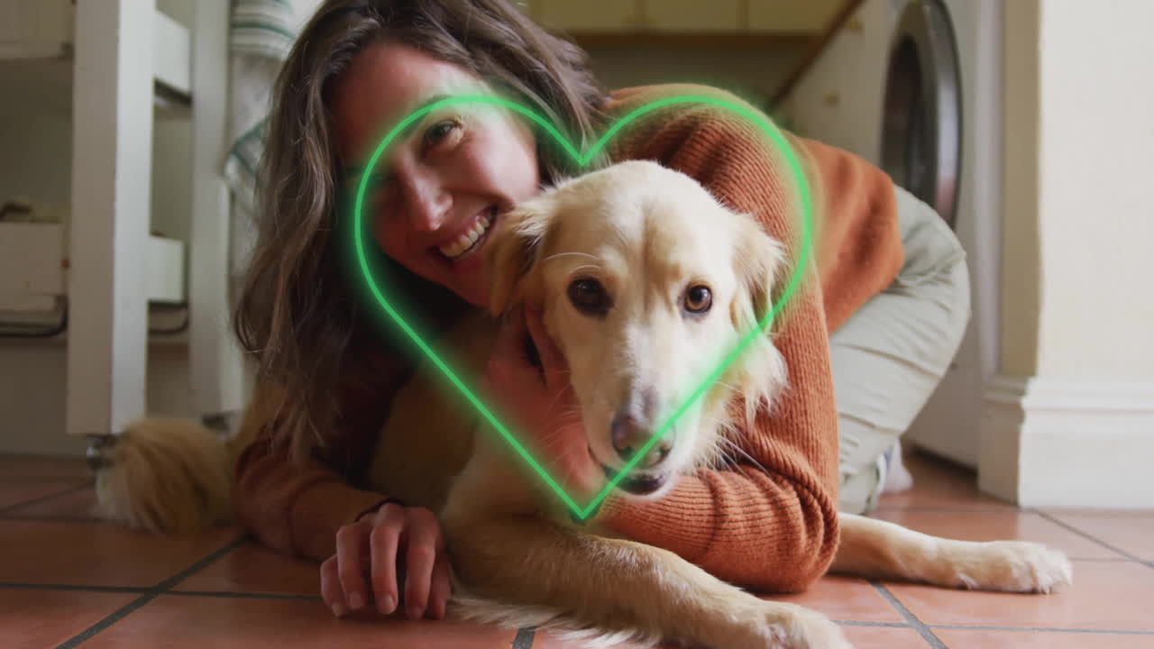 Woman hugging dog in home laundry area, glowing neon heart showcasing pet therapy benefits