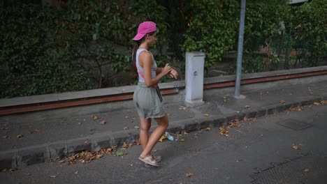 woman walking down a city street