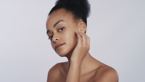 portrait-beautiful-african-american-woman-touching-face-with-hands-caressing-smooth-healthy-skin-complexion-enjoying-perfect-natural-beauty-on-white-background