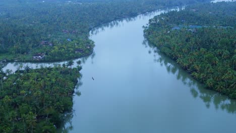 Munroe-Island,-Palm-trees-reflecting-in-backwaters,-Munroe-Island,-Kollam,-Kerala,-India,-Asia