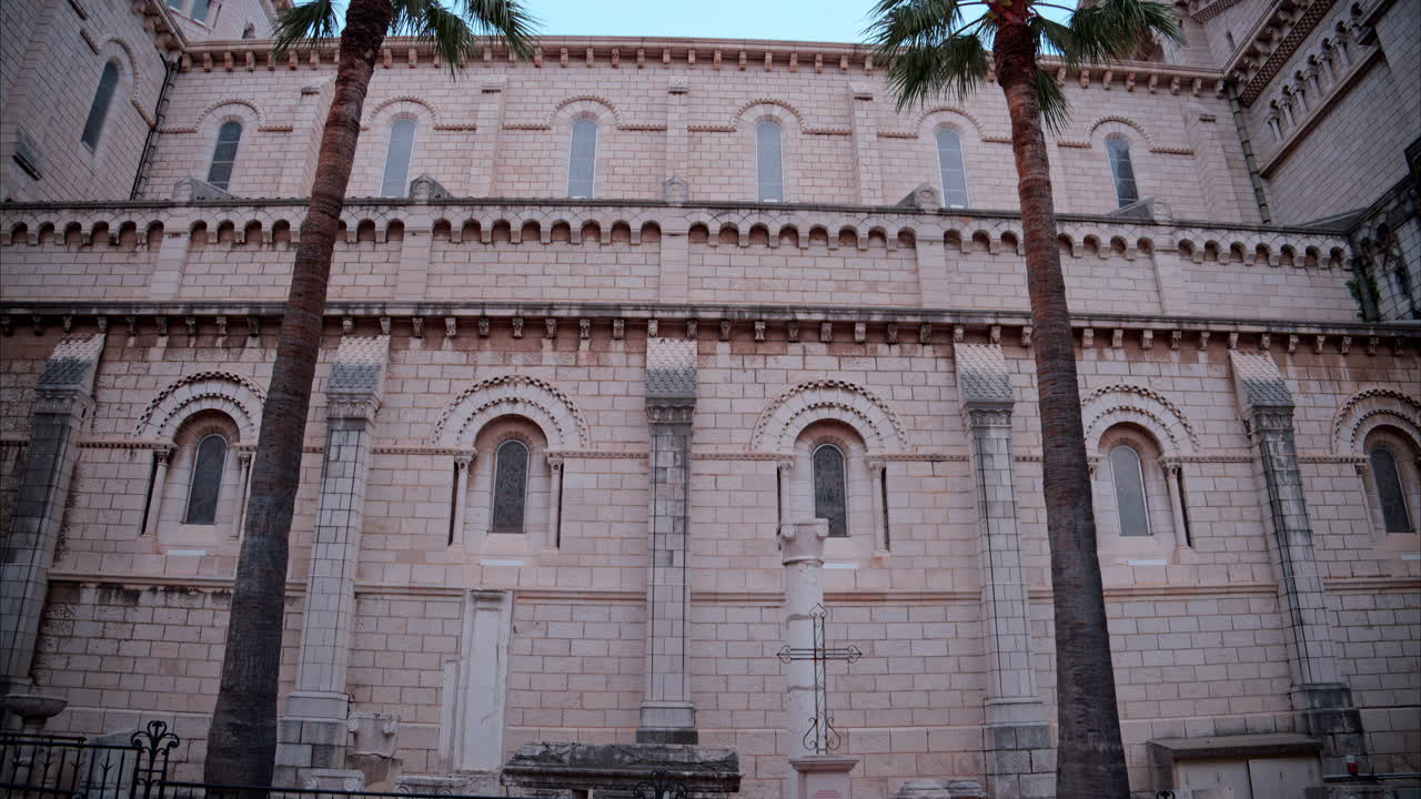 The facade of the Monaco Cathedral in the Old Town in the evening