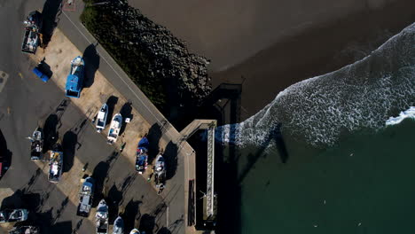 aerial view of fishing boats docked at a harbor