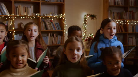 children's choir singing christmas carols