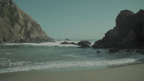 waves coming on shore at pfeiffer beach state park in big sur, california